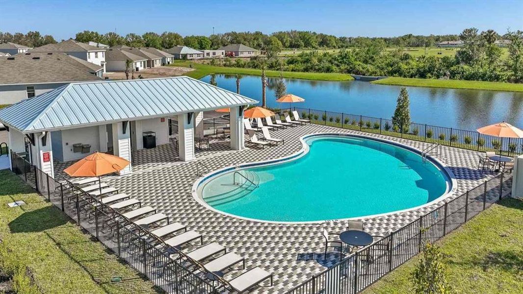 Front exterior of a new home in Mandarin Grove, Palmetto, FL, highlighting curb appeal (Image 17).