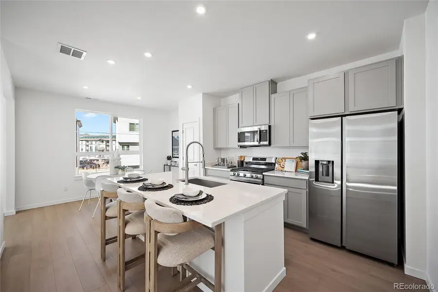 Furnished interior view inside a new home in The Commons at Victory Ridge, Colorado Springs (Image 10).