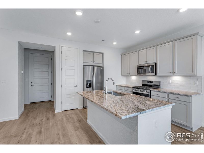 Furnished interior view inside a new home in Westside Crossing Townhomes, Berthoud (Image 9).