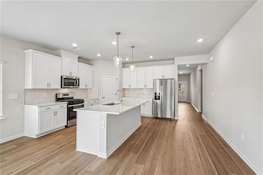 Furnished interior view inside a new home in Northwoods at Mirror Lake, Villa Rica (Image 12).