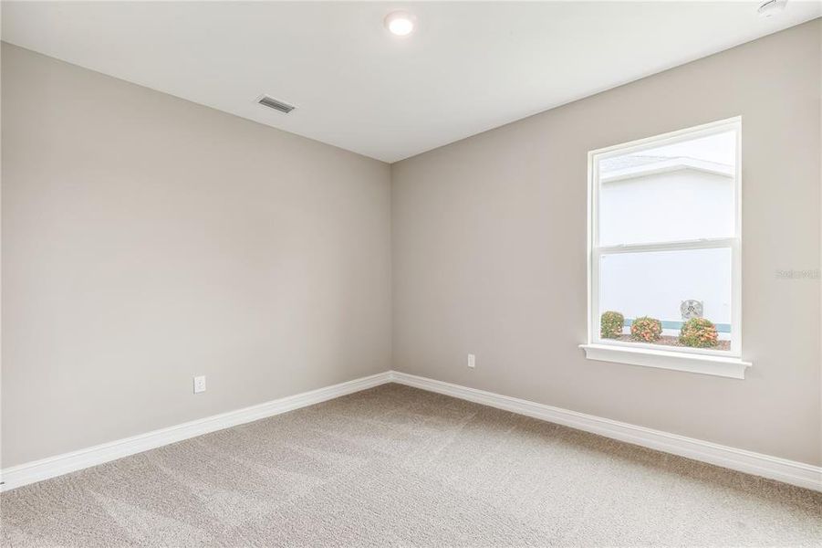 Spacious, unfurnished interior of a new home in Burnt Store Village, Punta Gorda (Image 14).