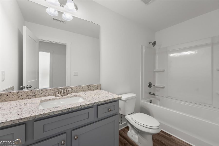 Furnished interior view inside a new home in Ellington Farms, Statham (Image 10).