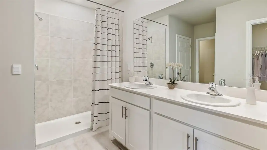 Furnished interior view inside a new home in Burnt Store Village, Punta Gorda (Image 8).