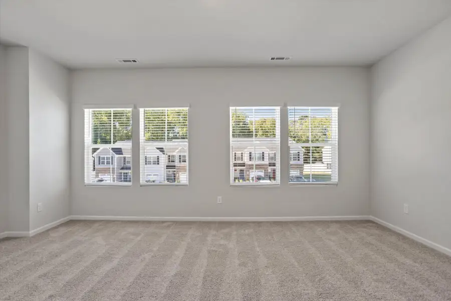 Spacious, unfurnished interior of a new home in West Main Townhomes, Sanford (Image 24).