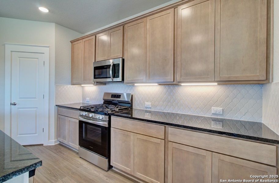 Furnished interior view inside a new home in Westridge - Premier, San Antonio (Image 4).