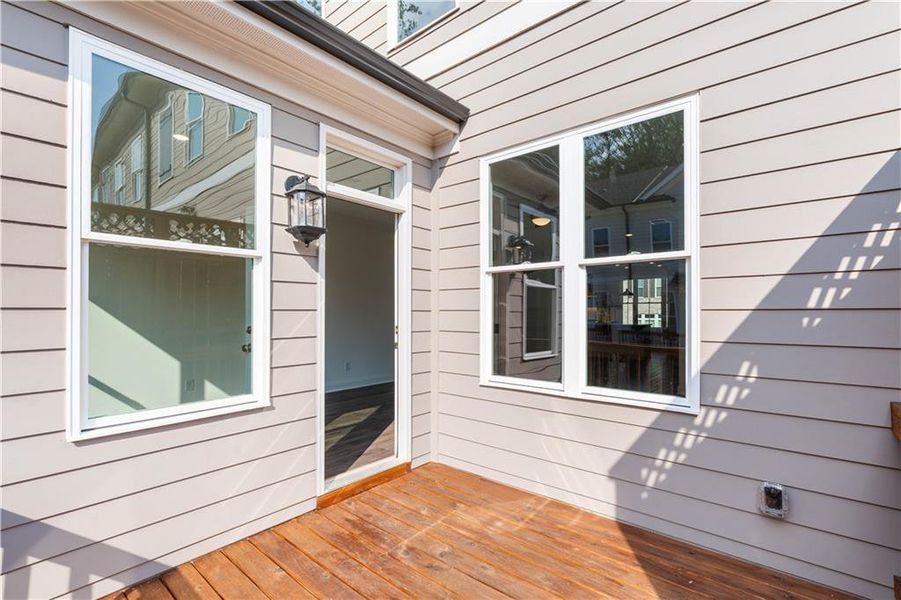 Exterior details and patio area of a home in Evanshire Townhomes, Duluth (Image 25).