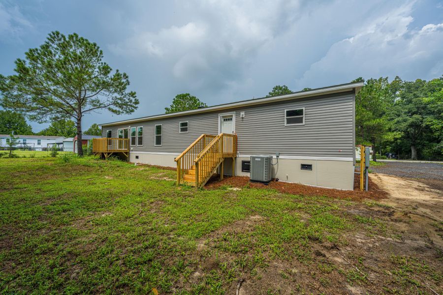Exterior details and patio area of a home in , Cottageville (Image 33).