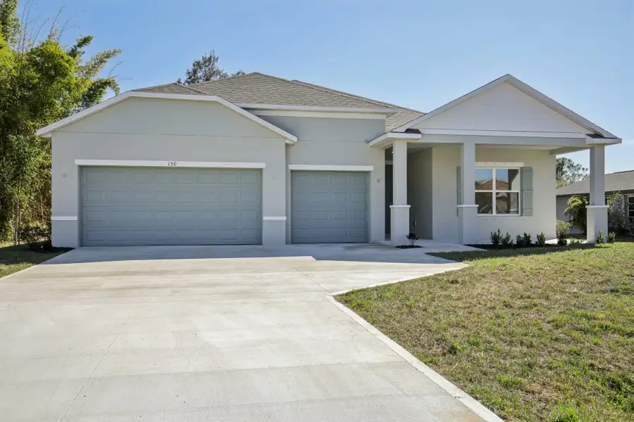 Representative exterior photo of a completed home built from the Melody by Maronda Homes in Englewood, Port Charlotte, FL (Image 20).