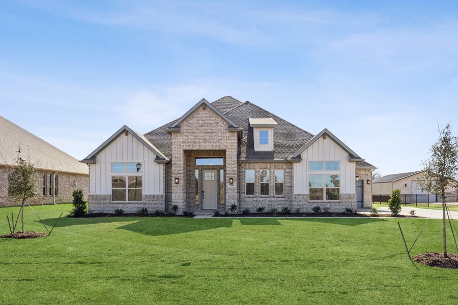 Front exterior of a new home in Joshua Meadows, Joshua, TX, highlighting curb appeal (Image 1). Front exterior of a new home in Joshua Meadows, Joshua, TX, highlighting curb appeal (Image 1).