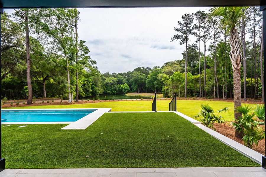 Exterior details and patio area of a home in , Johns Island (Image 51).