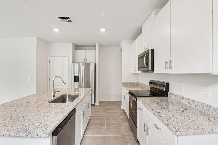 Furnished interior view inside a new home in Two Rivers - Premier Series, Zephyrhills (Image 6).