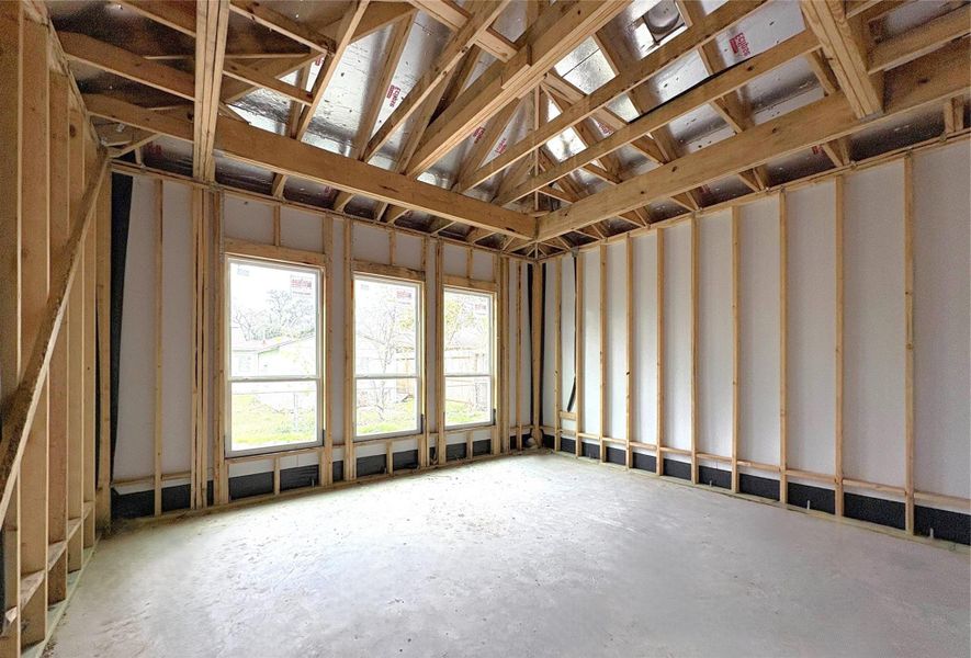 Light-Filled Primary Bedroom With Large Windows. Construction Photo as of 2/26/2026