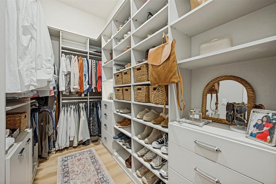Large closet with plenty of organizational space