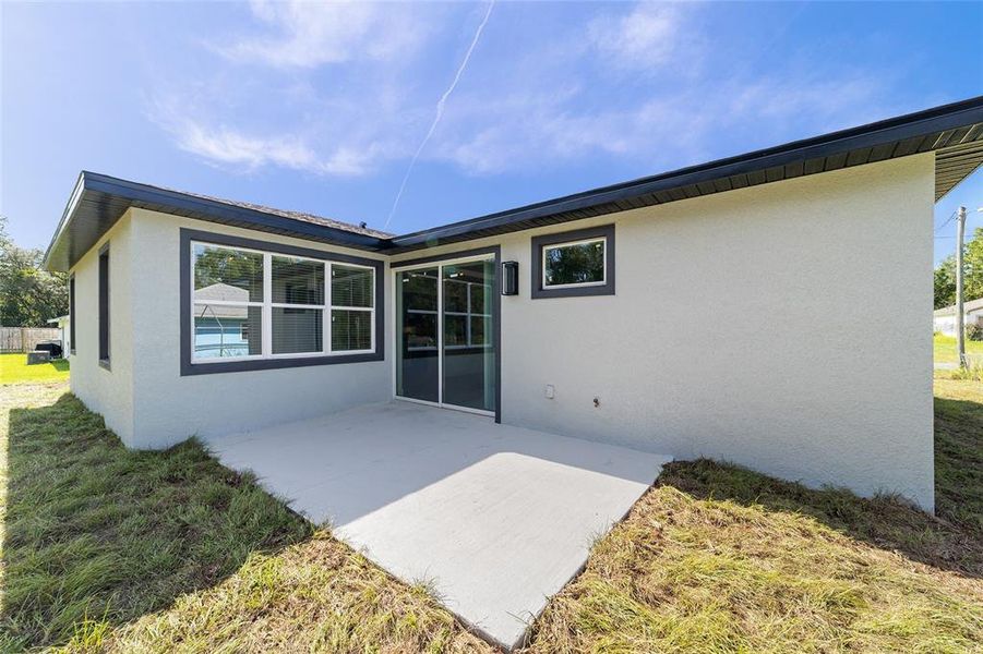 Front exterior of a new home in , Ocala, FL, highlighting curb appeal (Image 32).