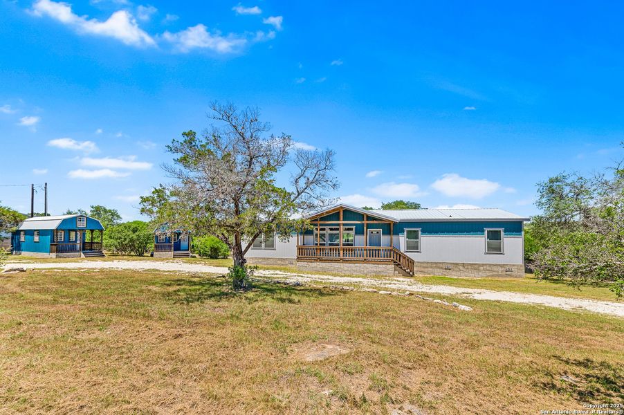Front exterior of a new home in , Spring Branch, TX, highlighting curb appeal (Image 27).