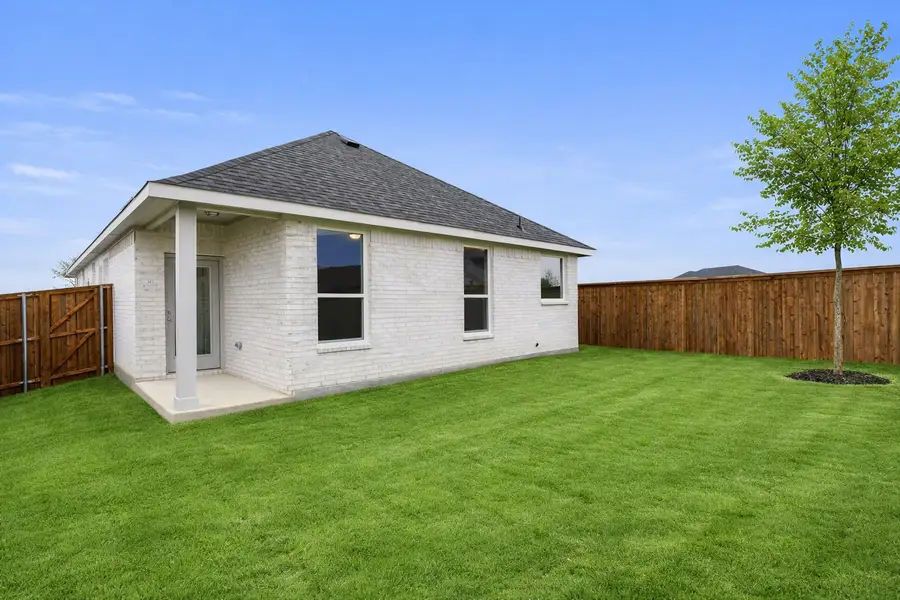 Exterior details and patio area of a home in Creekside, Royse City (Image 2). Exterior details and patio area of a home in Creekside, Royse City (Image 2).
