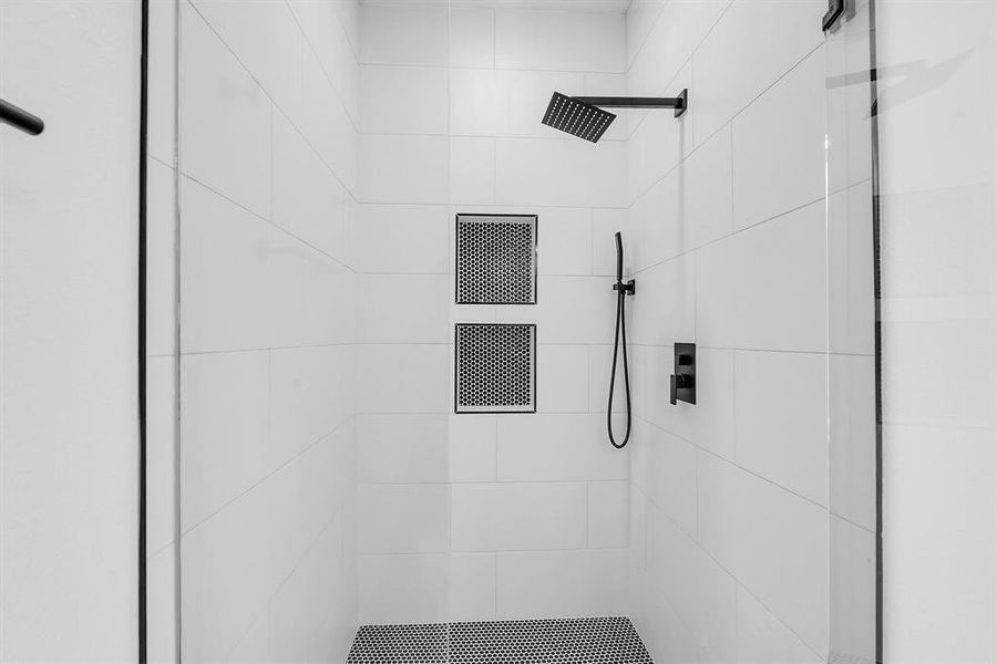 Bathroom with tiled shower