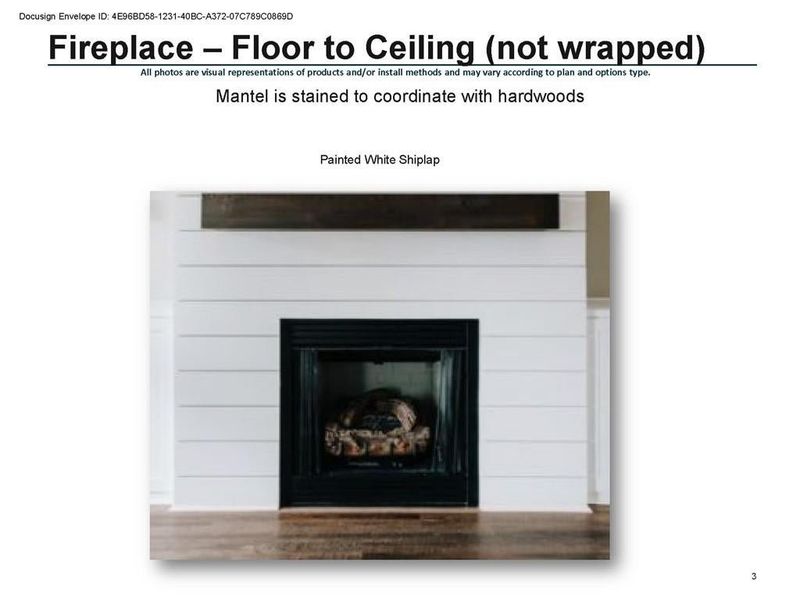 White shiplap fireplace in living room.