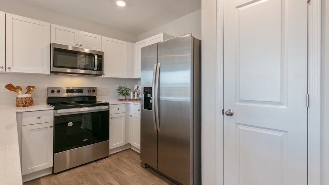 Furnished interior view inside a new home in The Townes at Ridgewood Farms, Winterville (Image 6).