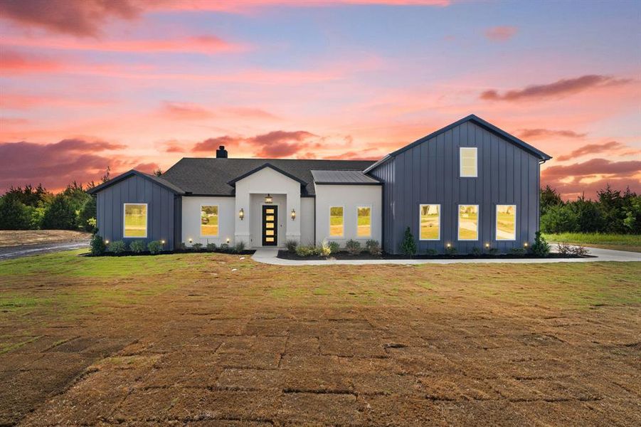 Front exterior of a new home in , Waxahachie, TX, highlighting curb appeal (Image 1). Front exterior of a new home in , Waxahachie, TX, highlighting curb appeal (Image 1).
