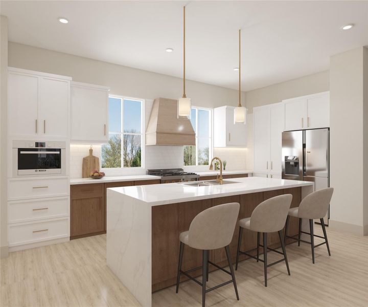 Modern kitchen with stainless steel appliances, quartz countertops, and an oversized island with seating.