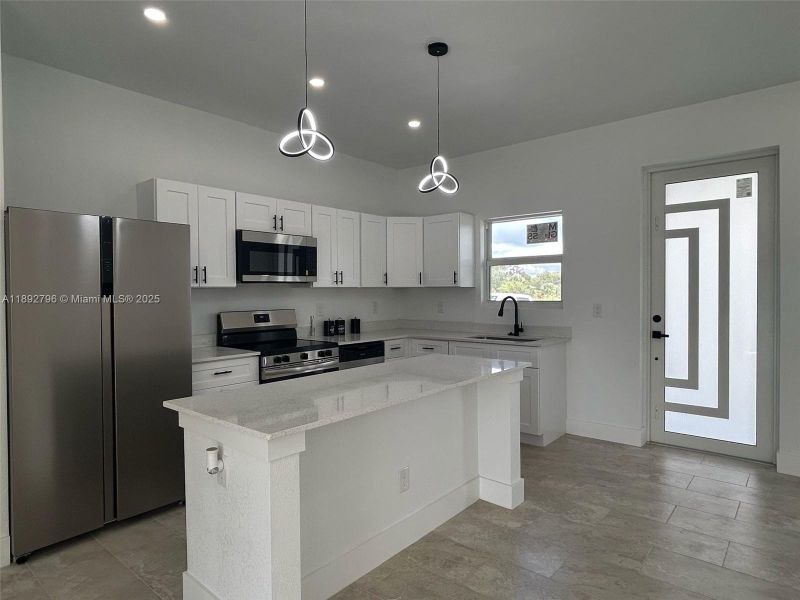 Furnished interior view inside a new home in , Lehigh Acres (Image 7). Furnished interior view inside a new home in , Lehigh Acres (Image 7).