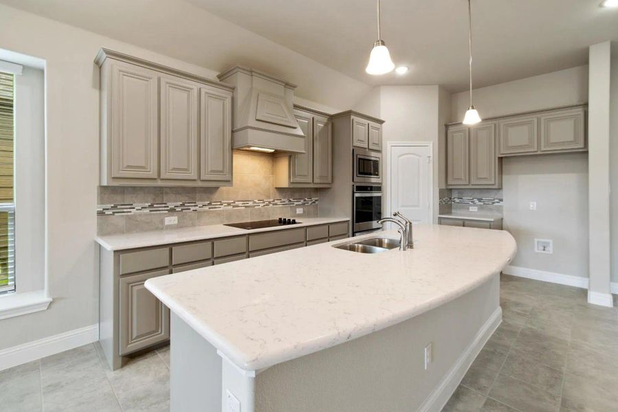 Kitchen | Concept 2129 at Redden Farms - Classic Series in Midlothian, TX by Landsea Homes