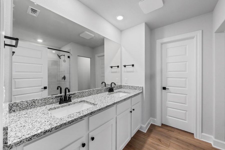 Furnished interior view inside a new home in Whisper Valley, Manor (Image 7).