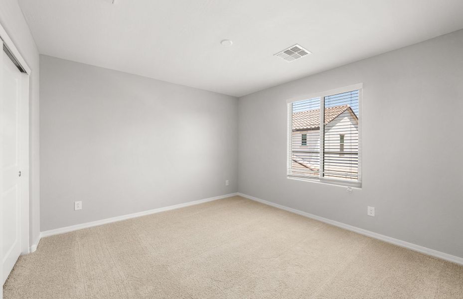 Spacious, unfurnished interior of a new home in Asante- Atrium Series, Surprise (Image 15).