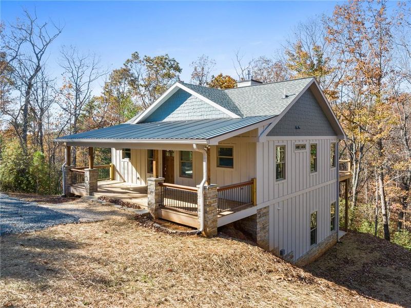 Exterior details and patio area of a home in , Ellijay (Image 18).