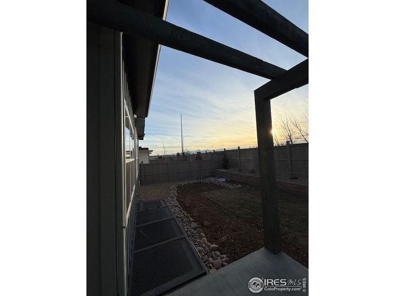 Exterior details and patio area of a home in West Grange, Longmont (Image 16).