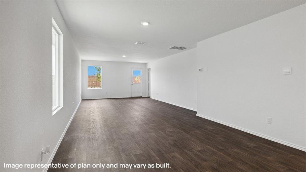 Unfurnished room featuring dark wood-type flooring and recessed lighting