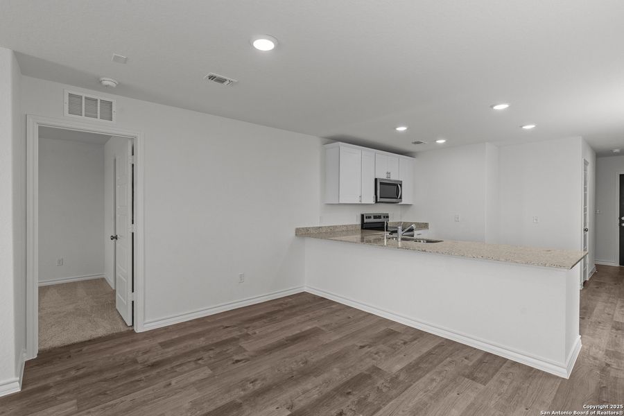 Furnished interior view inside a new home in Vista Real, Converse (Image 11).