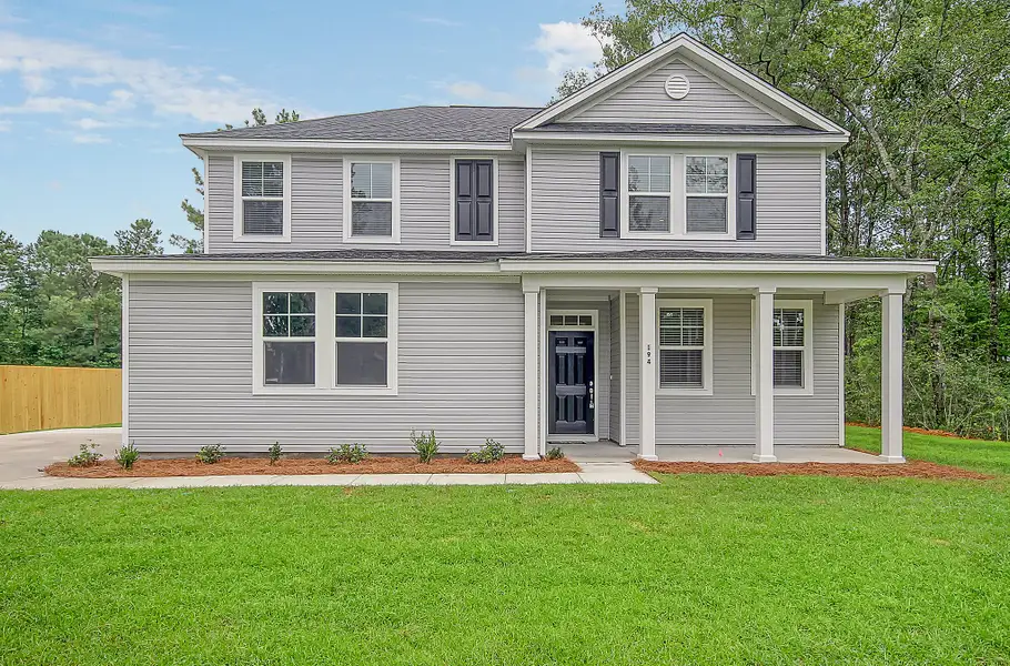 Representative exterior photo of a completed home built from the Grant by Hunter Quinn Homes in Charleston County Homes, North Charleston, SC (Image 13).