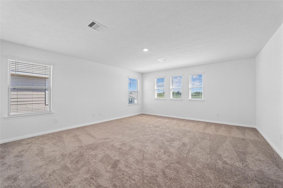 Head upstairs and enjoy the Loft—an additional living area perfect for a game room, media space, or a peaceful retreat.