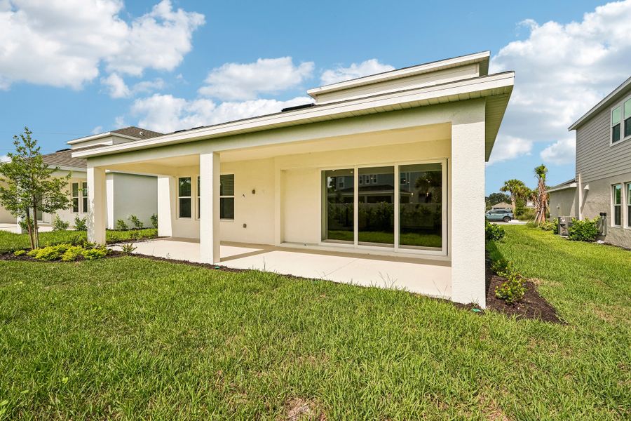 Exterior details and patio area of a home in Tiburon, Nokomis (Image 3).