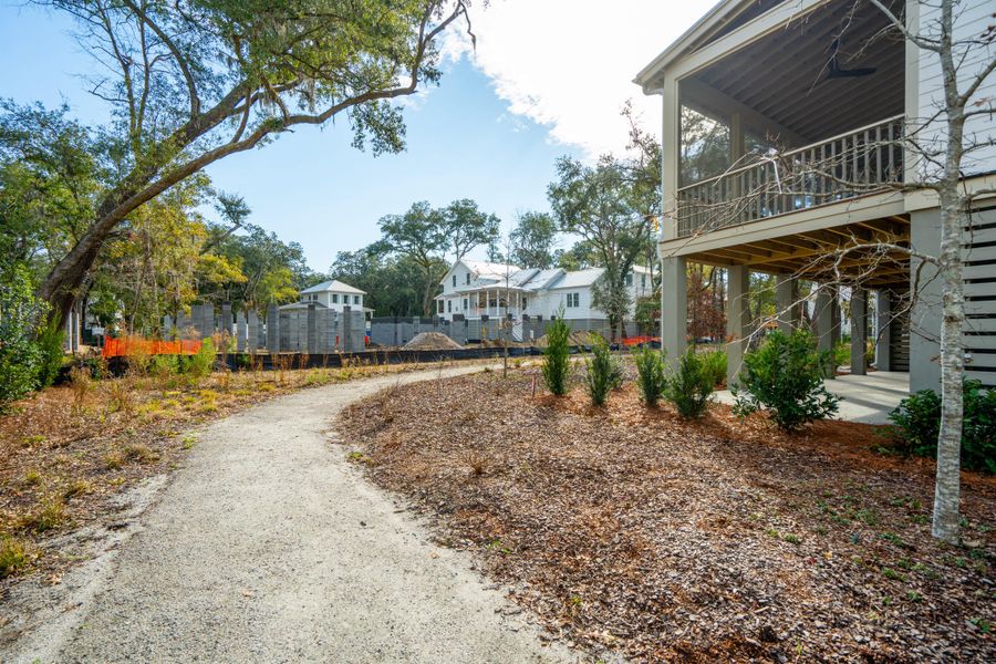 Exterior details and patio area of a home in , Johns Island (Image 29).
