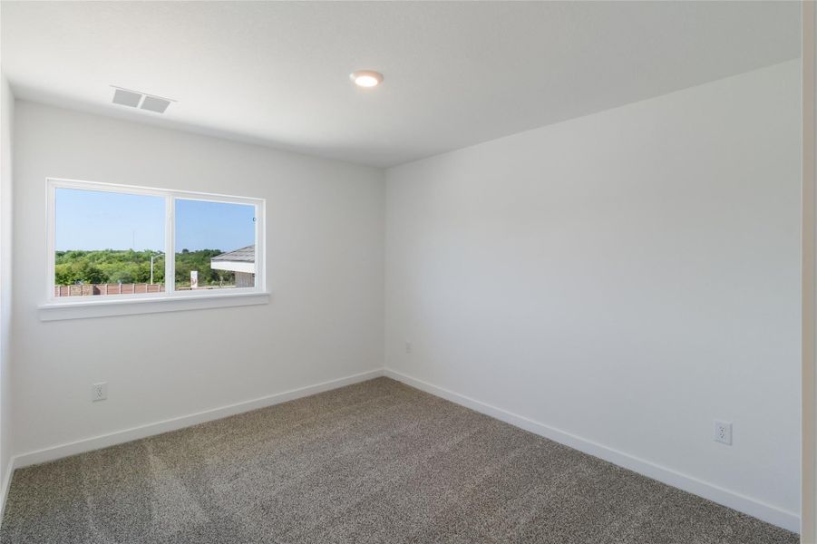 Spacious, unfurnished interior of a new home in Trails at Wildhorse, Austin (Image 23).