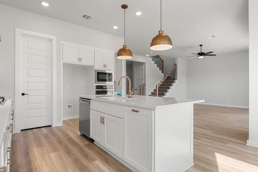 Furnished interior view inside a new home in Heritage, Dripping Springs (Image 6).