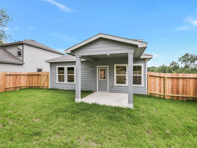 Exterior details and patio area of a home in Caney Creek Place, Conroe (Image 18). Exterior details and patio area of a home in Caney Creek Place, Conroe (Image 18).