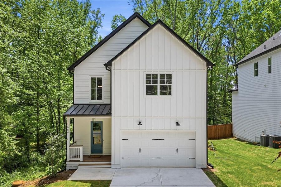 Front exterior of a new home in , Marietta, GA, highlighting curb appeal (Image 24). Front exterior of a new home in , Marietta, GA, highlighting curb appeal (Image 24).