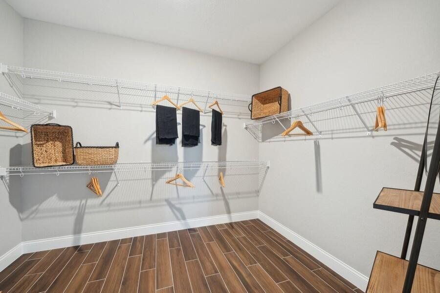 Primary Walk-in Closet Primary Walk-in Closet