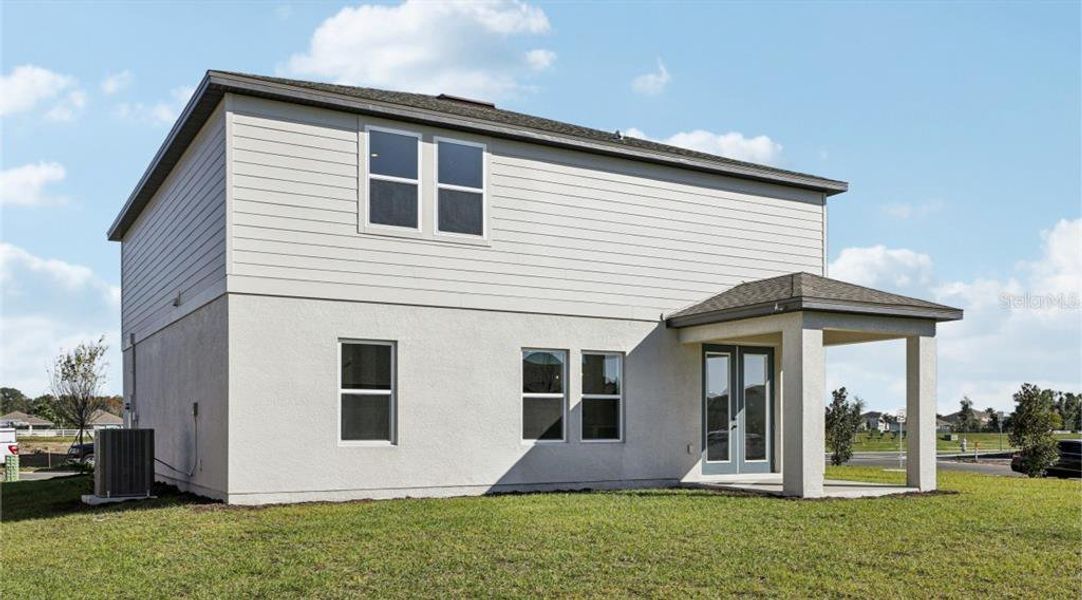 Exterior details and patio area of a home in Tyson Reserve, St. Cloud (Image 3).