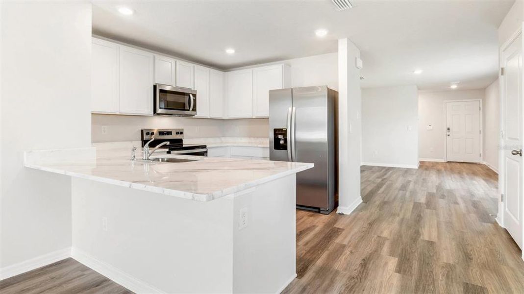 Furnished interior view inside a new home in Bella Lago, Parrish (Image 8).