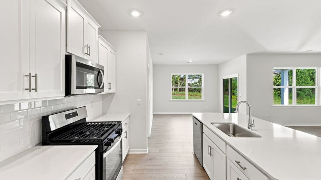 Furnished interior view inside a new home in Durbin Meadows Traditions, Fountain Inn (Image 8).