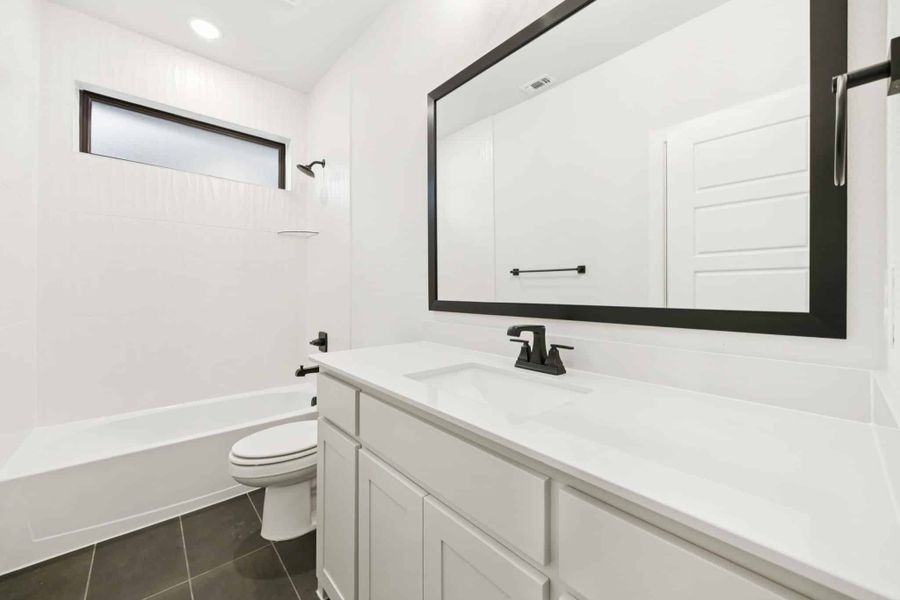 Furnished interior view inside a new home in The Grove Frisco, Frisco (Image 15).