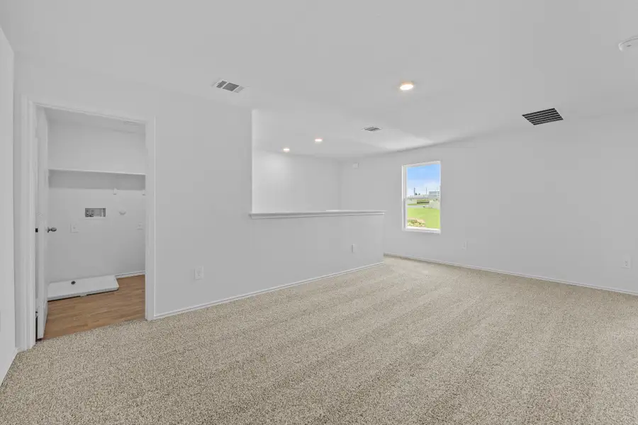 Spacious, unfurnished interior of a new home in Prairie Lakes, Buda (Image 23). Spacious, unfurnished interior of a new home in Prairie Lakes, Buda (Image 23).
