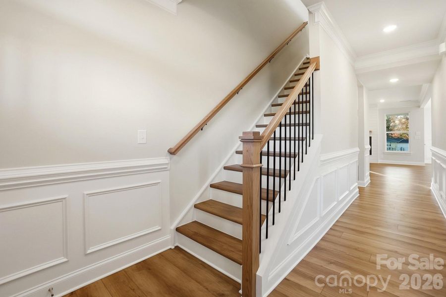 Stairs with composite treads and metal balusters