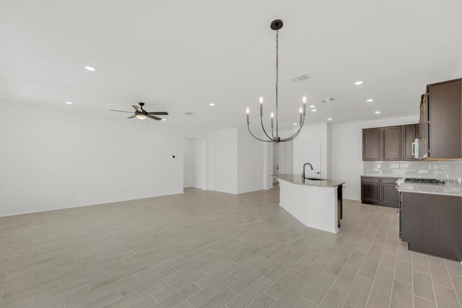 Furnished interior view inside a new home in Salerno - Classic Collection, Round Rock (Image 12). Furnished interior view inside a new home in Salerno - Classic Collection, Round Rock (Image 12).