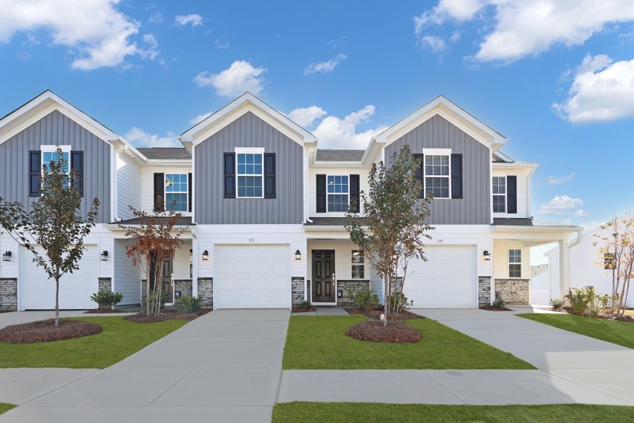 Front exterior of a new home in Kings Crossing: Timber, King, NC, highlighting curb appeal (Image 1).
